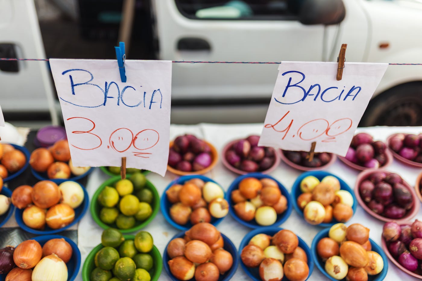 Local market stall with colorful produce.
